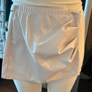 PrettyLittleThing Cream Mini Skirt